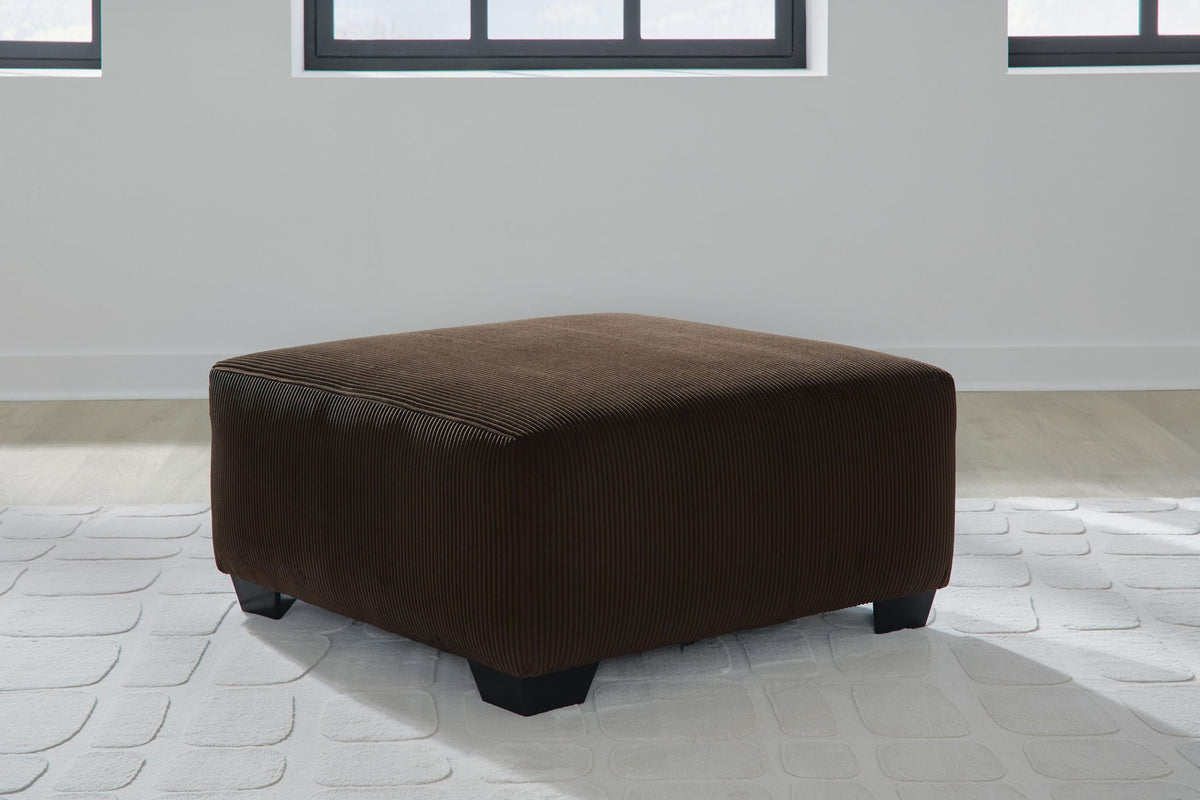 Kimlee - Sectional And Ottoman Set