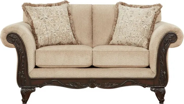 Beige sofa with decorative pillows on a white background